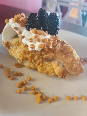 Fried Apple Pie Butterscotch whipped cream and blackberry